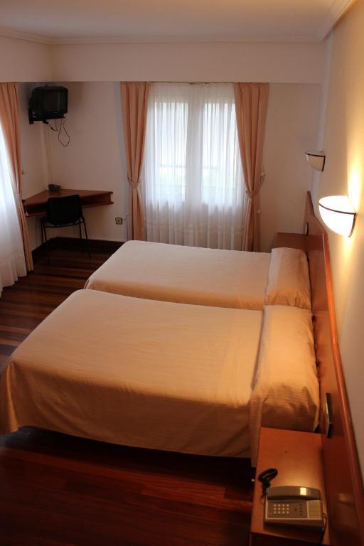 Hotel Sindika Onate Bilik gambar