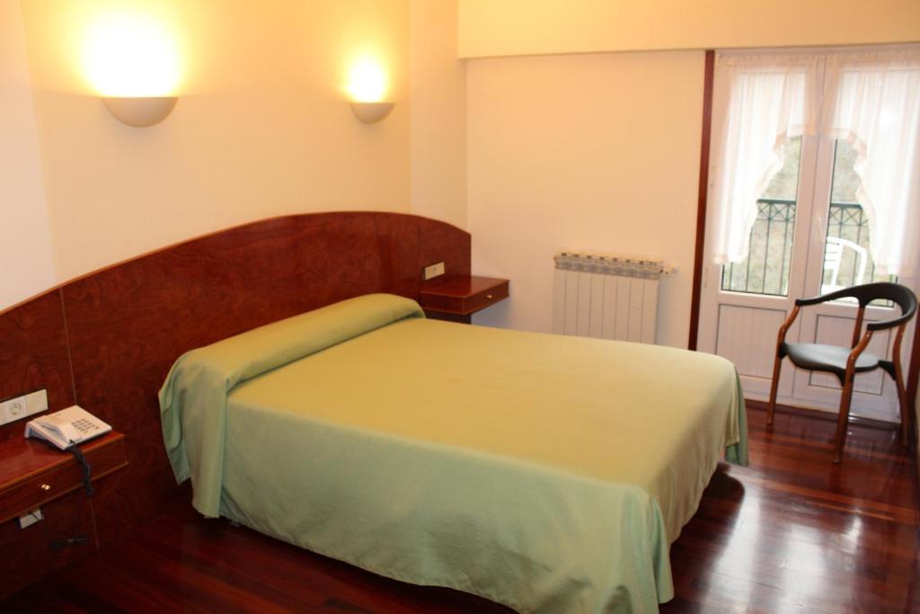 Hotel Sindika Onate Bilik gambar